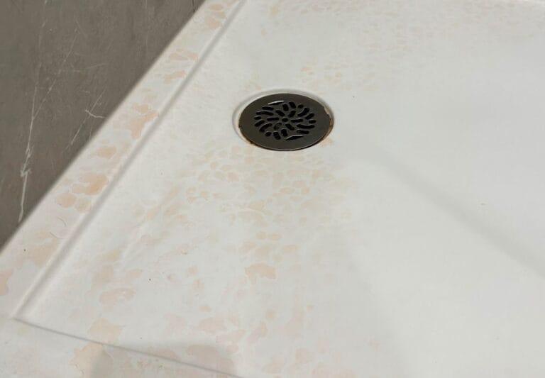 Why Does My Water Leave Pink Residue? The Definitive Guide to Causes, Risks, and Solutions